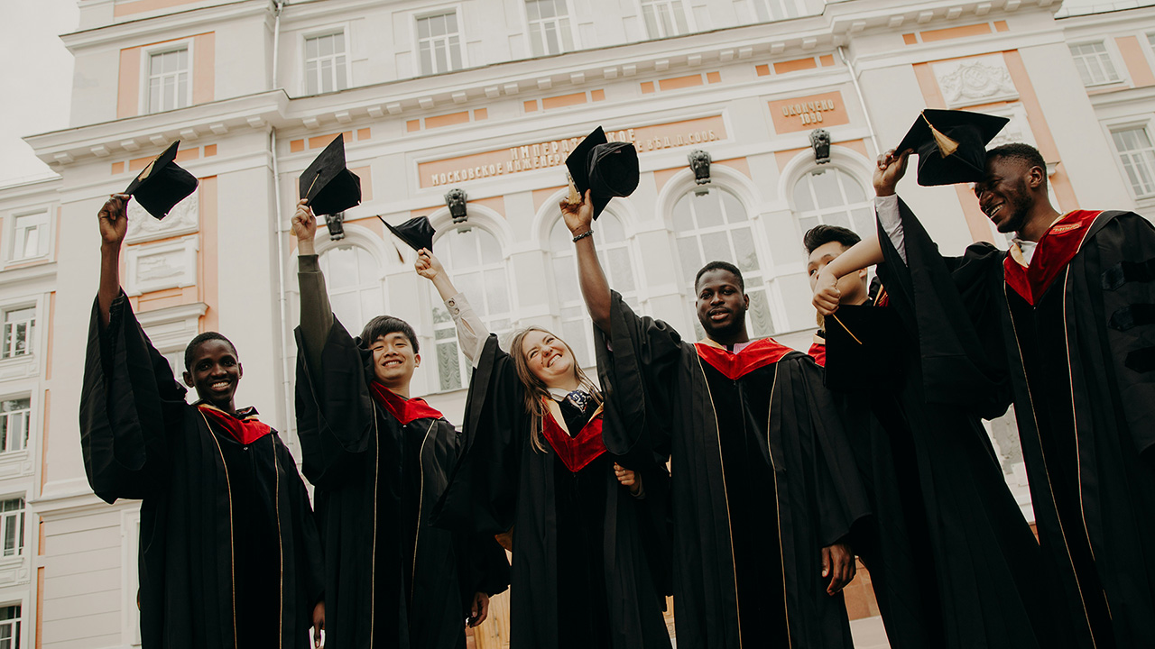 Graduates Throwing Their Caps